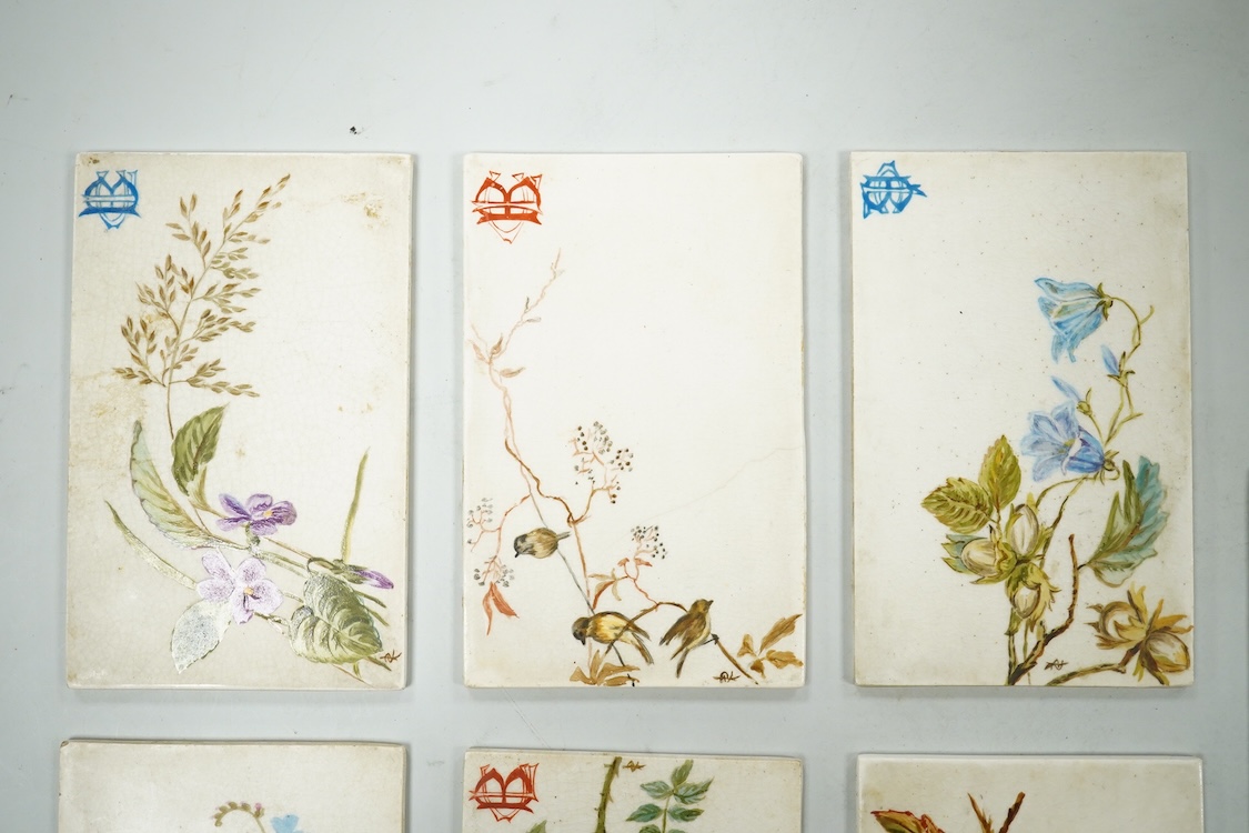 Set of seven late 19th century miniature floral painted pottery plaques, each monogramed 8.5cm high, possibly for place settings